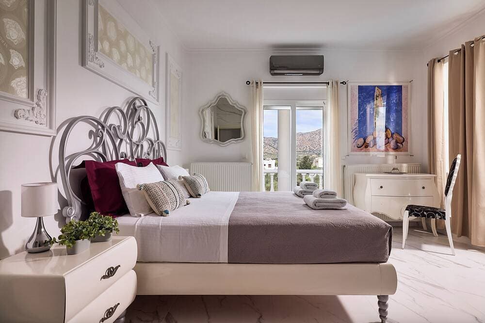 Foto 12 von 30: Luxury White House - Family Villa Near Sea - Zorbas Beach with playground, bikes