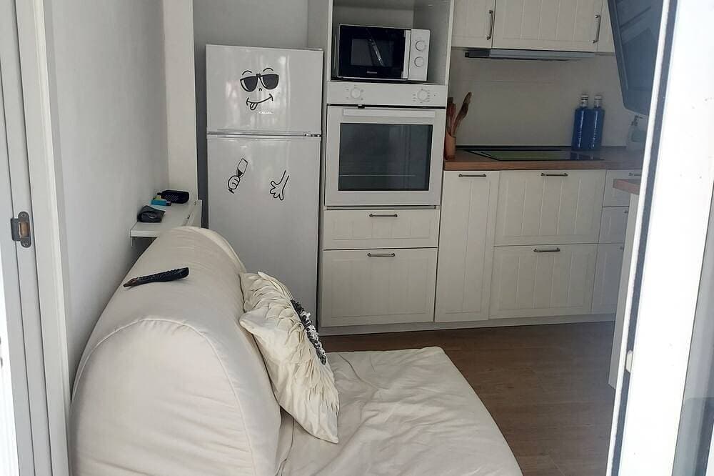 Foto 12 von 18: Small Loft With City And Sea Views