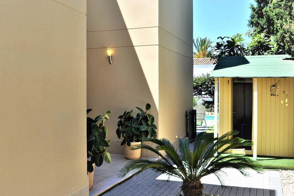 Foto 8 von 30: Villa Hugo Casa en zona residencial tranquila Bahía Grande con Piscina Privada.