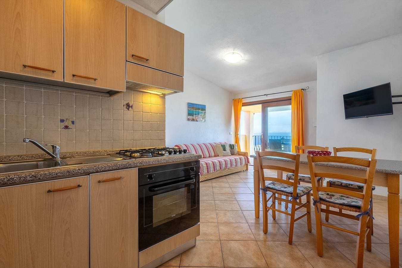 Foto 9 von 37: Ferienwohnung 'Sea View Isola Rossa Apartment' mit Meerblick, WLAN und Klimaanlage