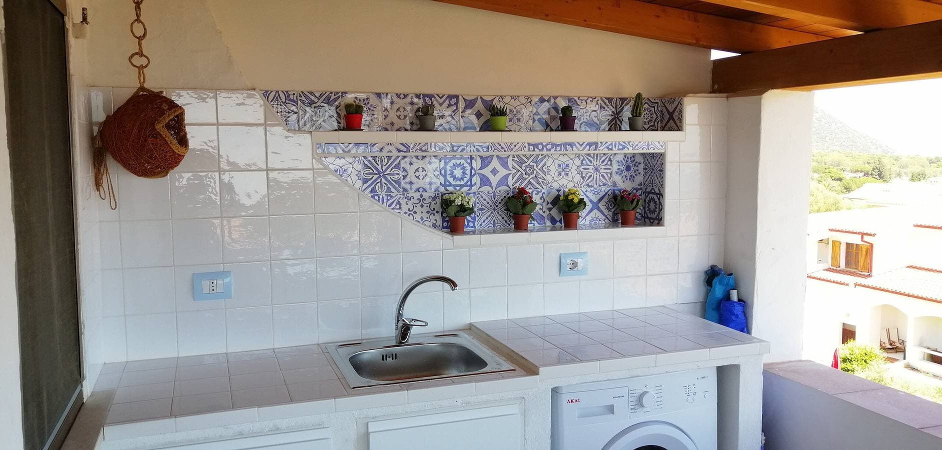 Foto 12 von 42: Ferienhaus 'Arcaidu' mit Meerblick, Balkon und Klimaanlage