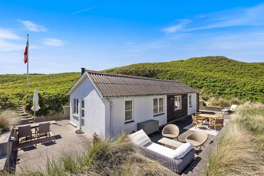 Foto 2 von 35: Helles 4-Personen Ferienhaus nur 50 Meter vom Strand entfernt