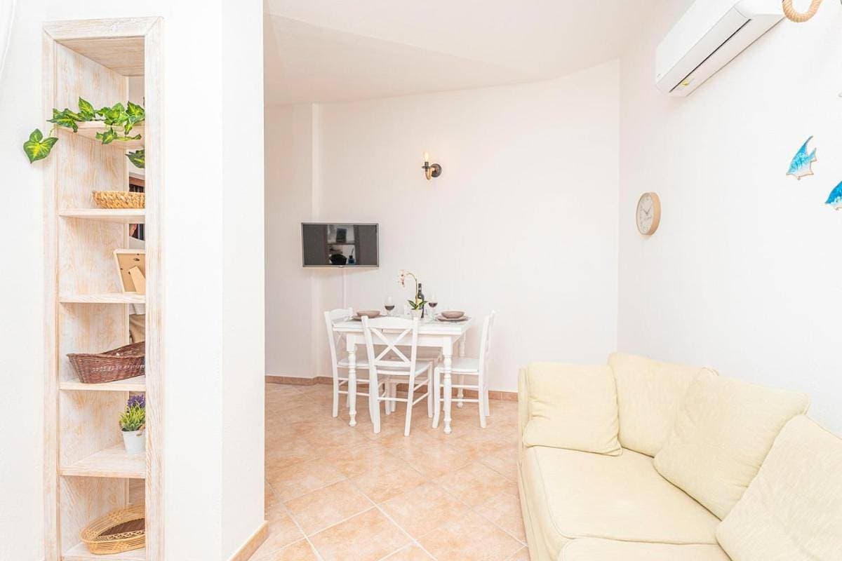 Foto 13 von 24: Terrazza Privata, pochi passi dalla Spiaggia Porto Taverna