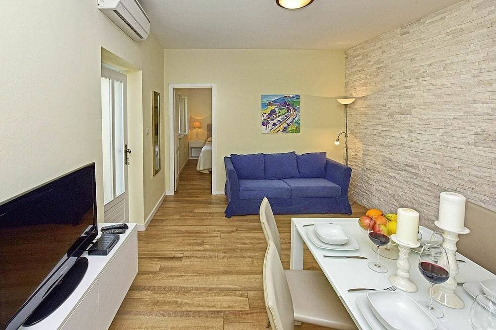 Foto 6 von 30: Schöne Wohnung in einem Ferienhaus für 4 Gäste mit Klimaanlage,  W-Lan, Pool, TV und Terrasse