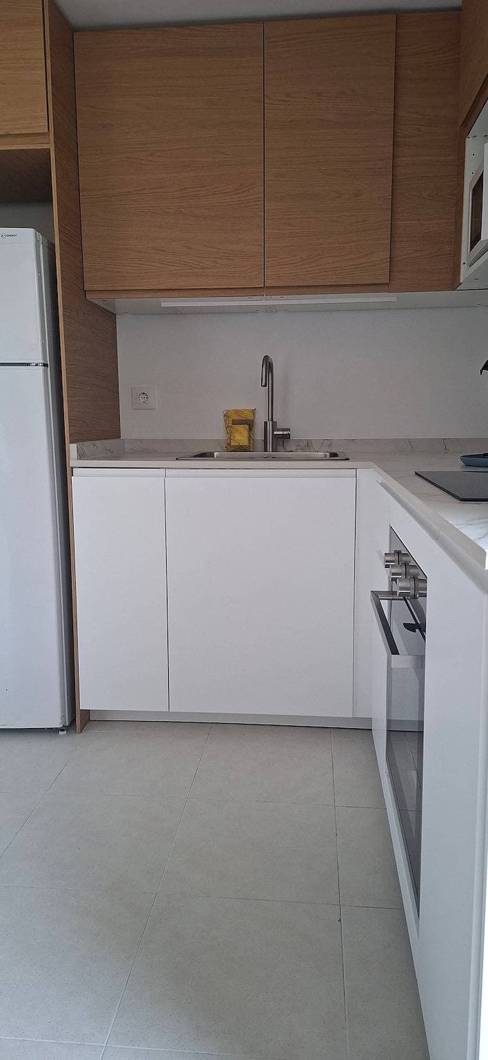 Foto 6 von 28: Ferienwohnung 'Oro Del Mar IV 02' mit Gemeinschaftspool, Garten & WLAN