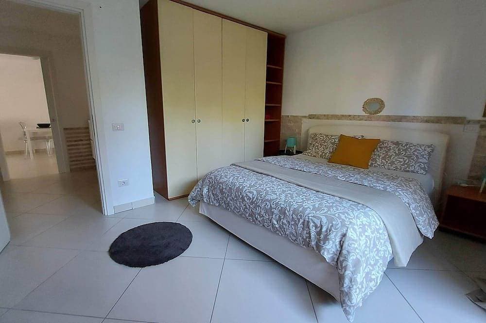 Foto 6 von 30: Villa Luigi_Poggio dei Pini: Unterkunft in einer Villa mit Parkplatz und Wallbox
