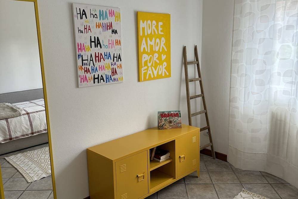 Foto 4 von 22: Maddy'S House Spacious apartment furnished with care and originality