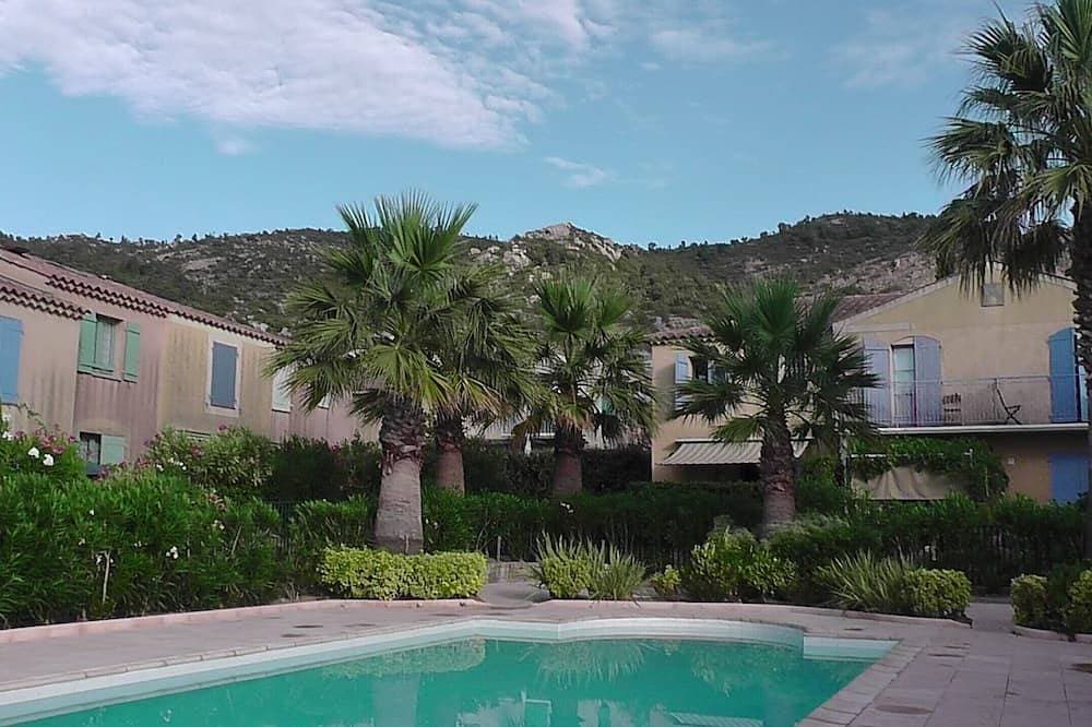 Foto 11 von 11: Maison L'Olivade  dans résidence privée  avec pisc