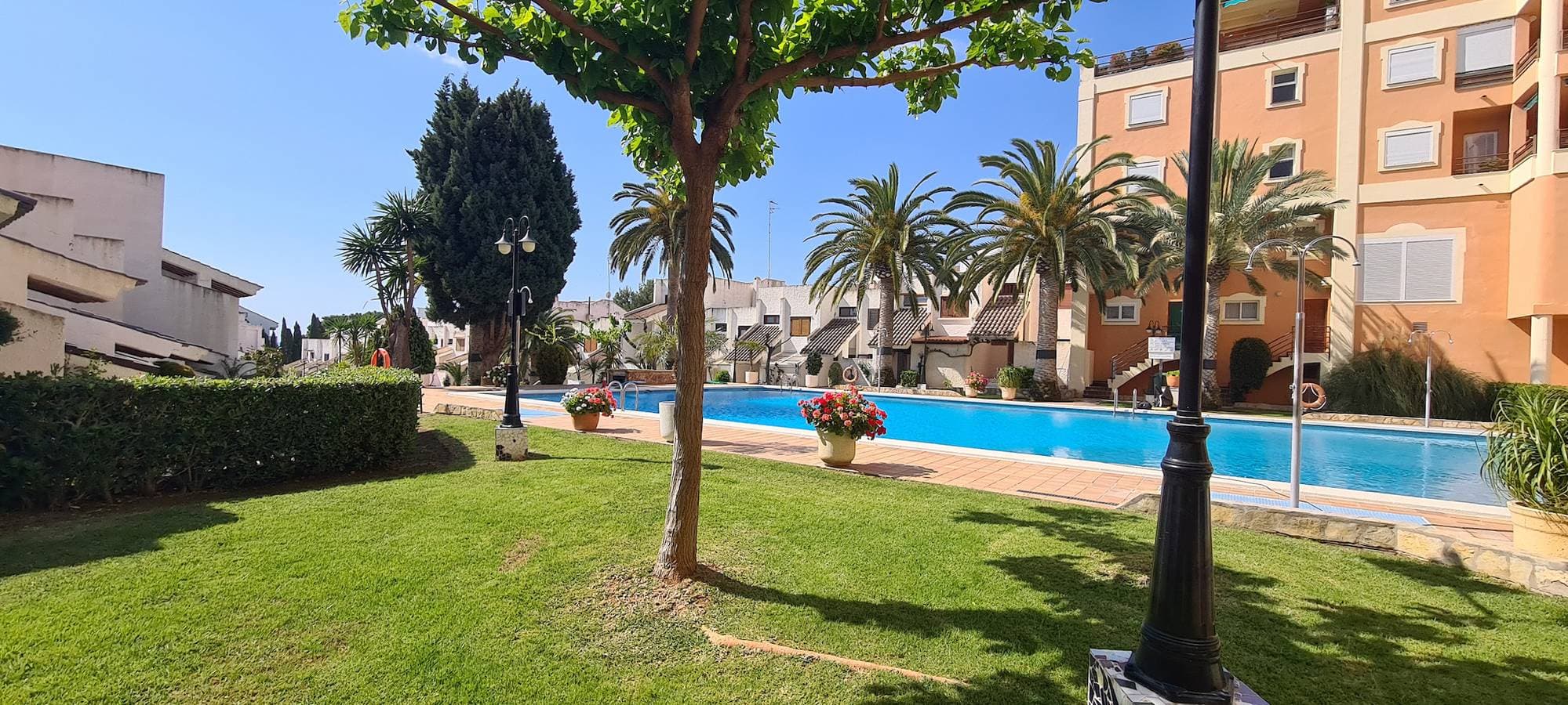 Casa adosada con piscina y jardín Las Fuentes 1