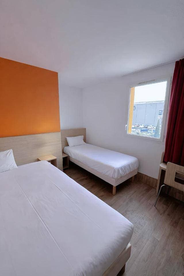 Foto 7 von 9: Quadruple Room