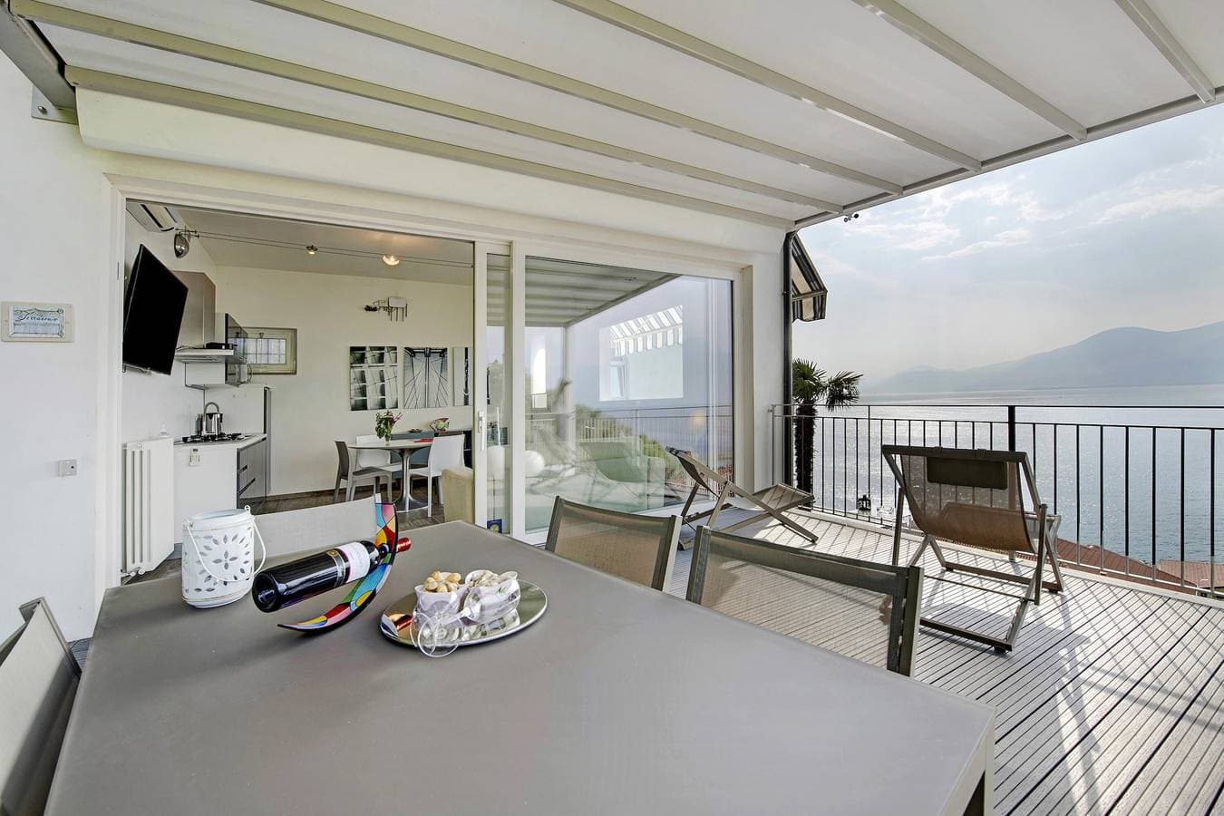 Foto 5 von 29: Ferienwohnung "Residenz La Mignon Terrazza" mit Seeblick, Klimaanlage und Terrasse