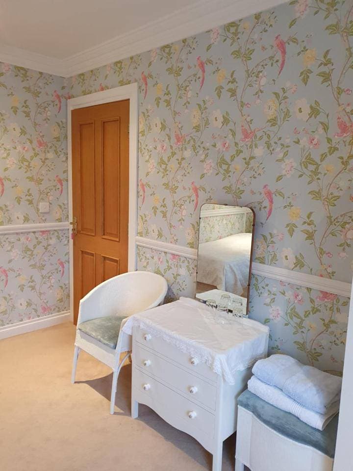 Foto 10 von 24: Superior Triple Room with Private Bathroom