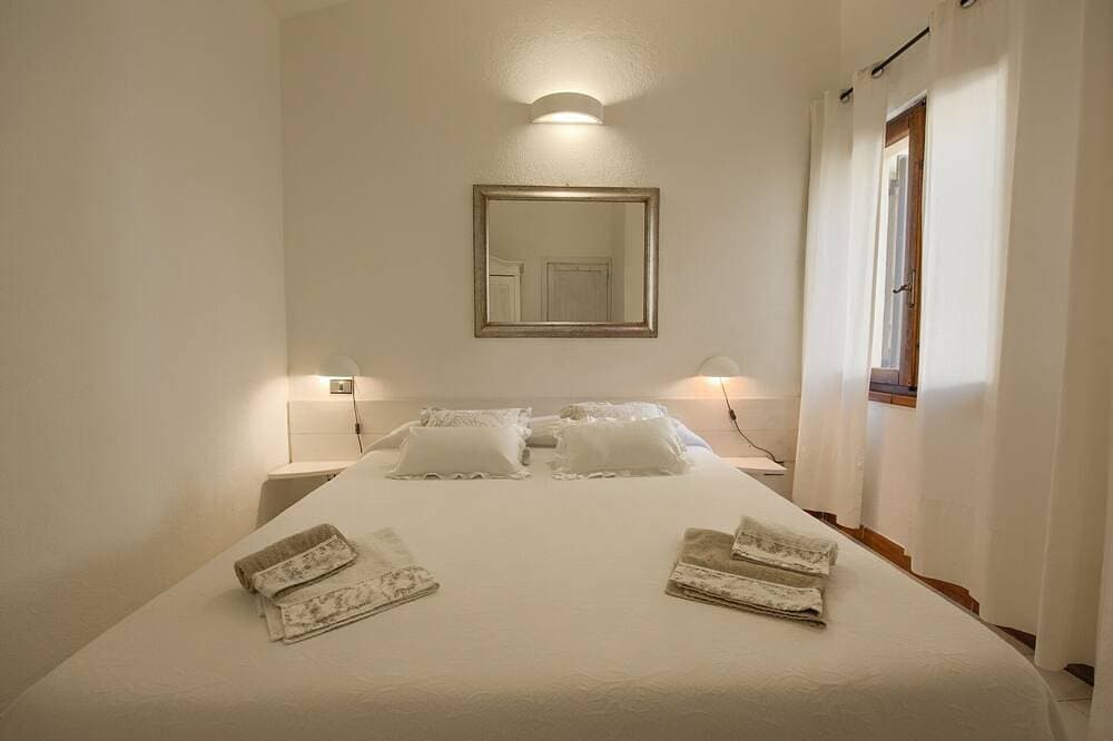 Foto 2 von 30: Villetta Waterfront Cala Caterina, direct access to the beach, Wi-Fi
