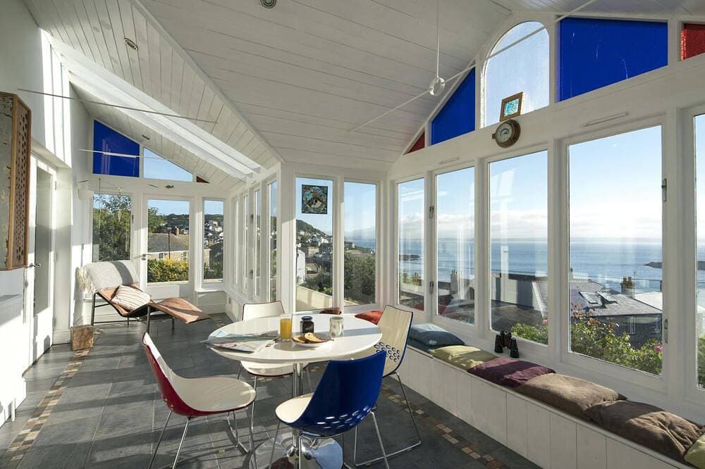 Spectacular panoramic sea views of Mounts Bay from this light filled home 1