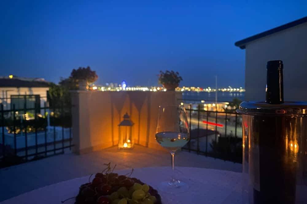 Apartment für 4 Personen mit Blick auf den Strand und Terrasse mit Meerblick 1