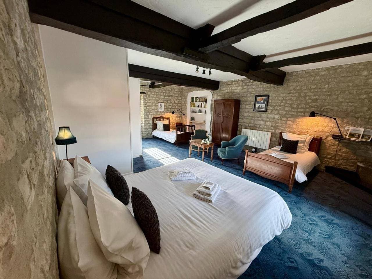Foto 8 von 22: Quadruple Room with Garden View