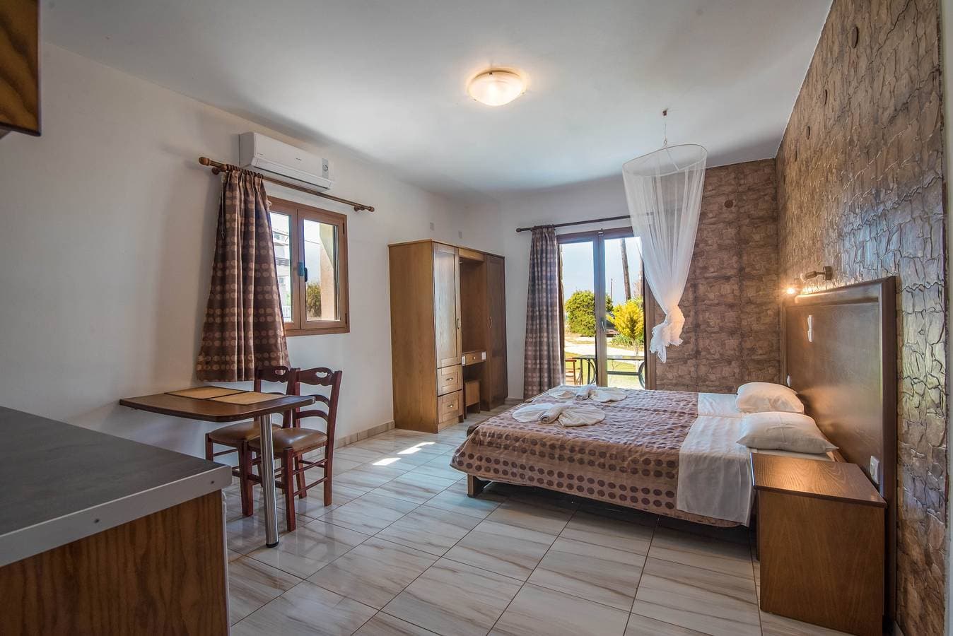 Foto 7 von 23: Mirage Arillas Studio Typ B14' mit Meerblick, Gemeinschaftspool und WLAN