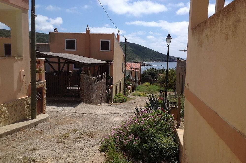 Foto 10 von 30: Casa Valentina (Loc. Porto Palma) mit Veranda und Garten, mt. 150 vom Strand entfernt