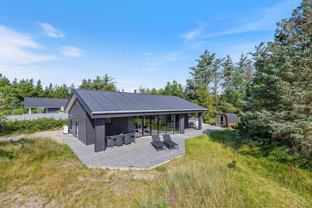 Modernes Ferienhaus mit Badetonne und Außensauna 1