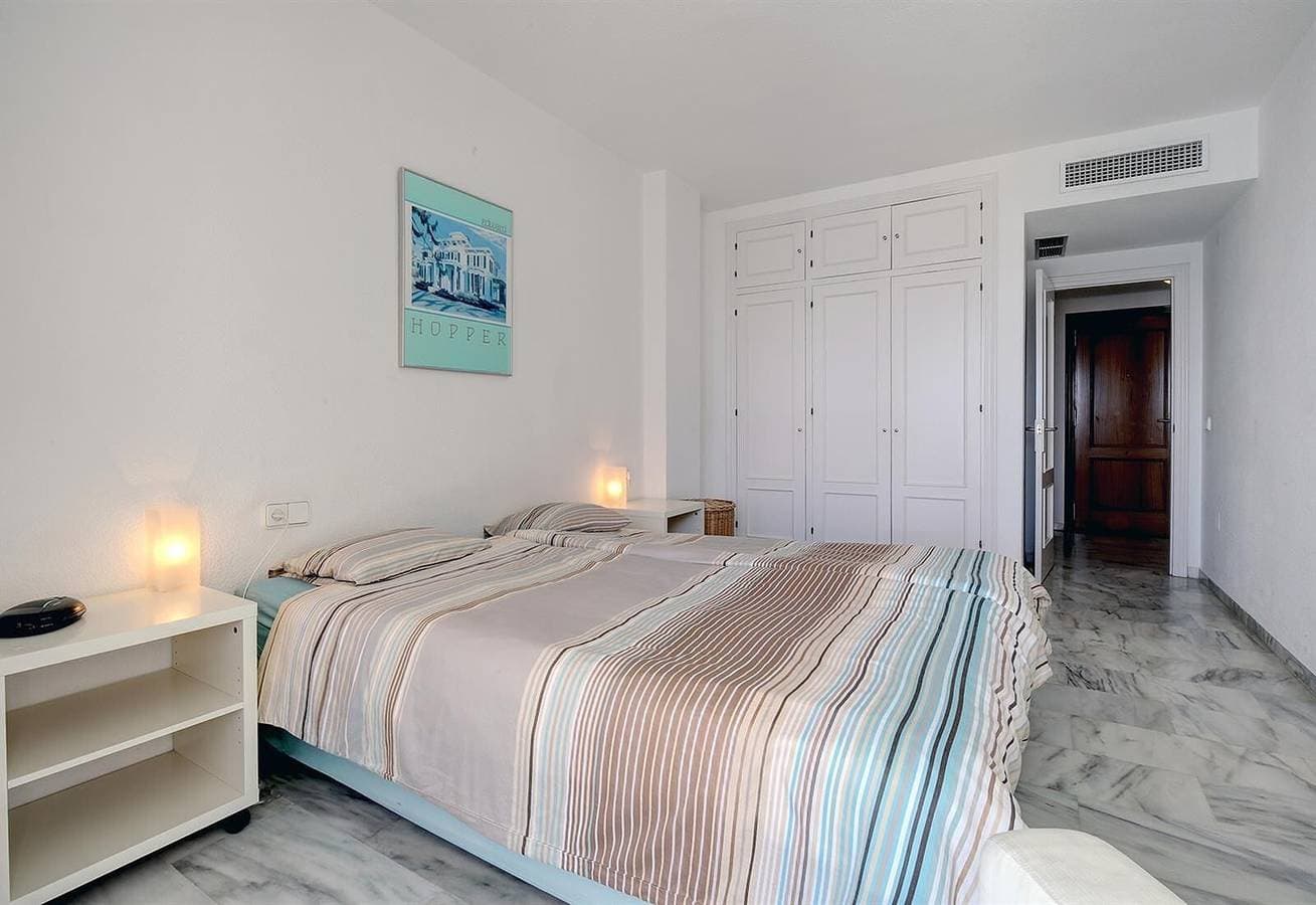 Foto 8 von 25: Ferienwohnung "Boulevard 205" mit Meerblick, Pool, Balkon, Terrasse & Garten