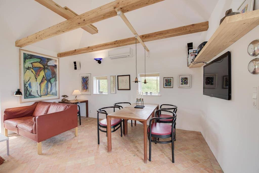 Foto 2 von 25: Einzigartiges Ferienhaus inklusive Wellenrauschen - 50 m Strand