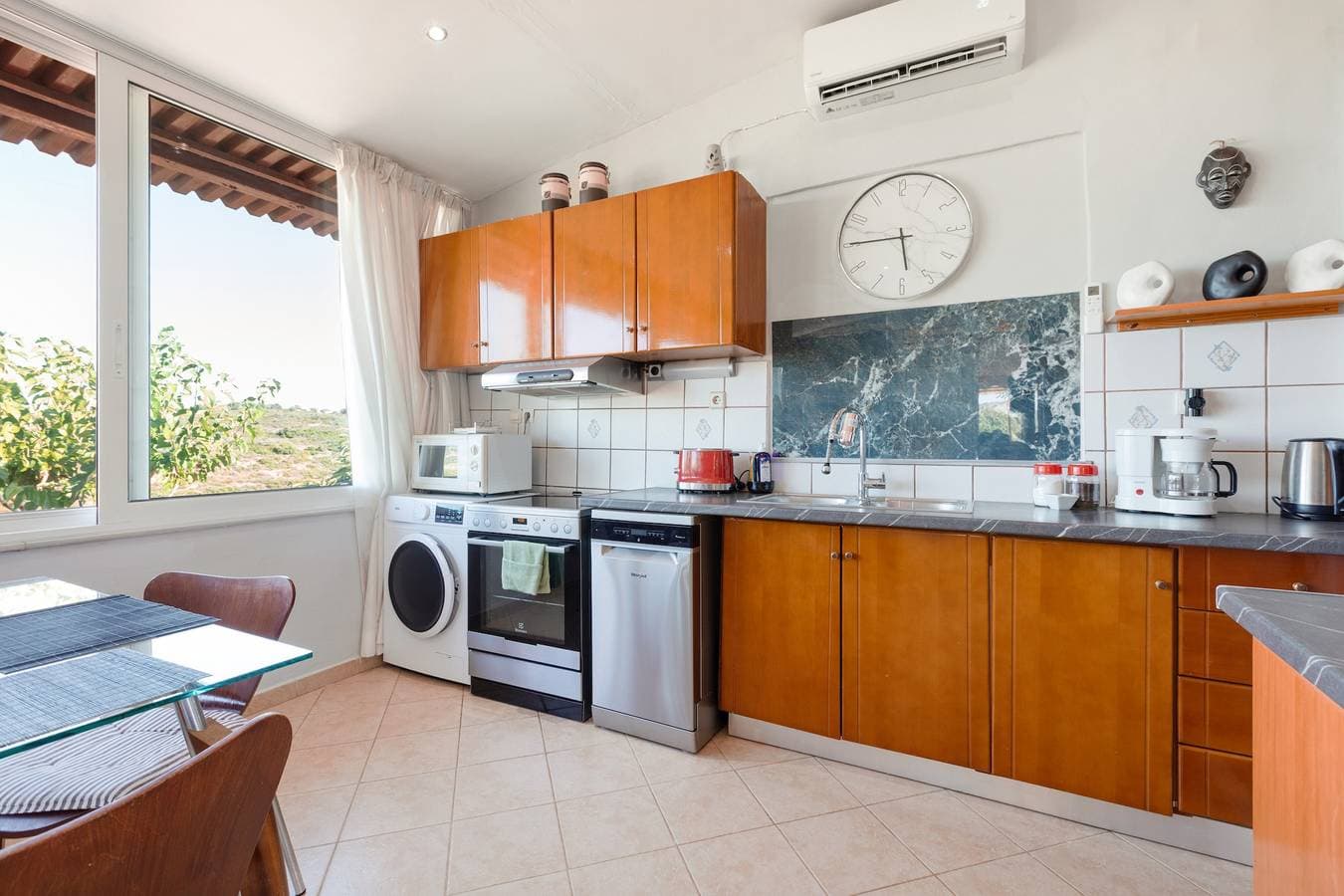 Foto 6 von 33: Ferienhaus „Voula Home“ mit Meerblick, WLAN und Klimaanlage