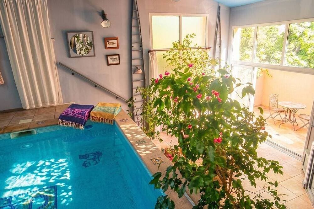 Charmante Cottages, privater beheizter Pool und Solarium im Innenbereich, privater Außenbereich 1