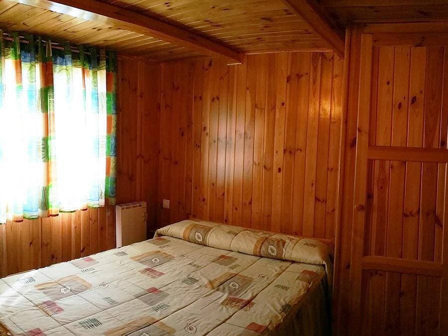 Foto 9 von 50: Camping La Soleia d'Oix - Bungalow 6 personen