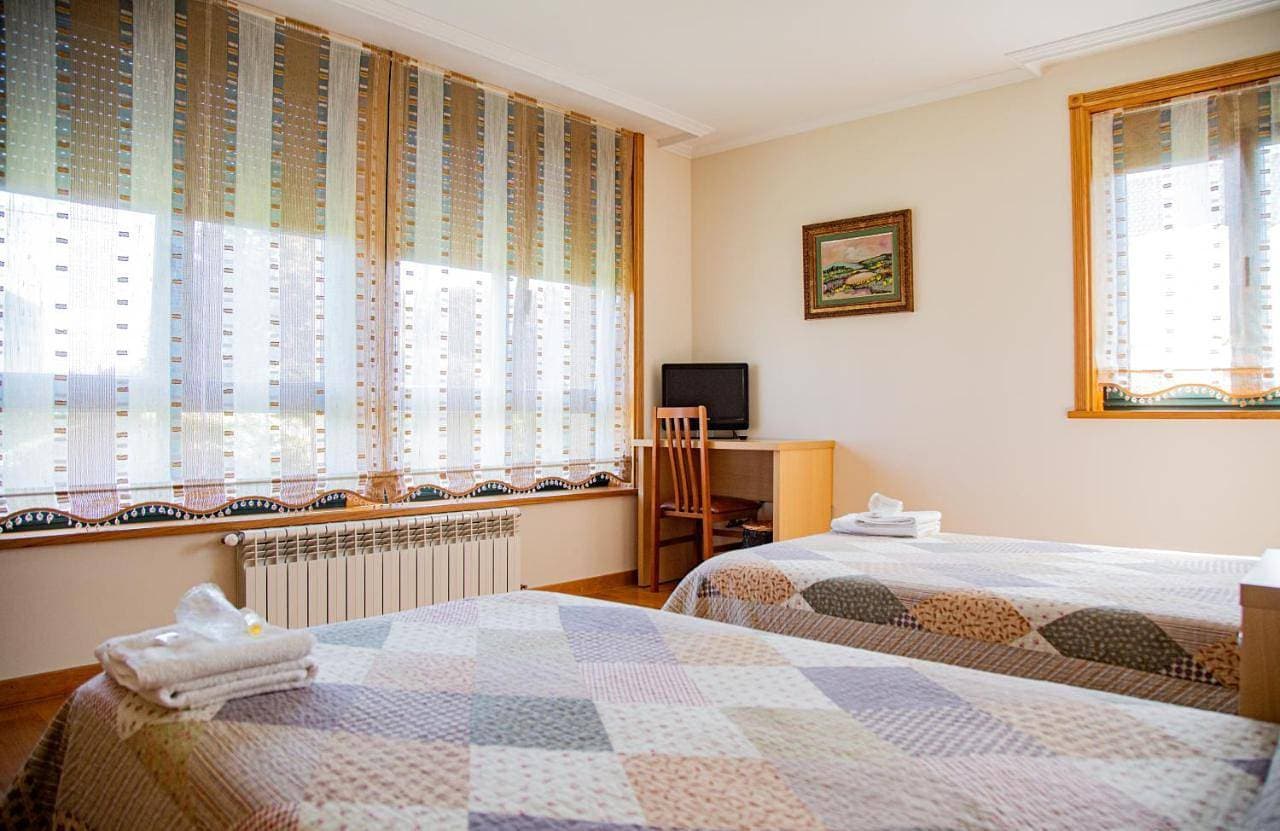 Foto 6 von 8: Standard Twin Room with Shared Bathroom