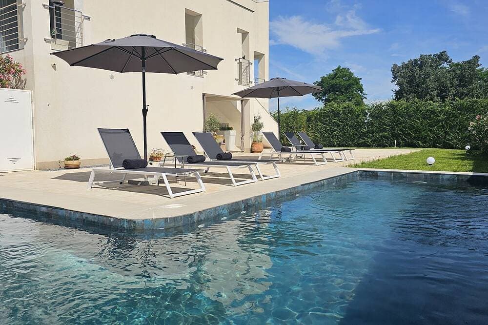 Foto 13 von 22: Bezauberndes und hundefreundliches Apartment mit Pool, Privatparkplatz, Klima