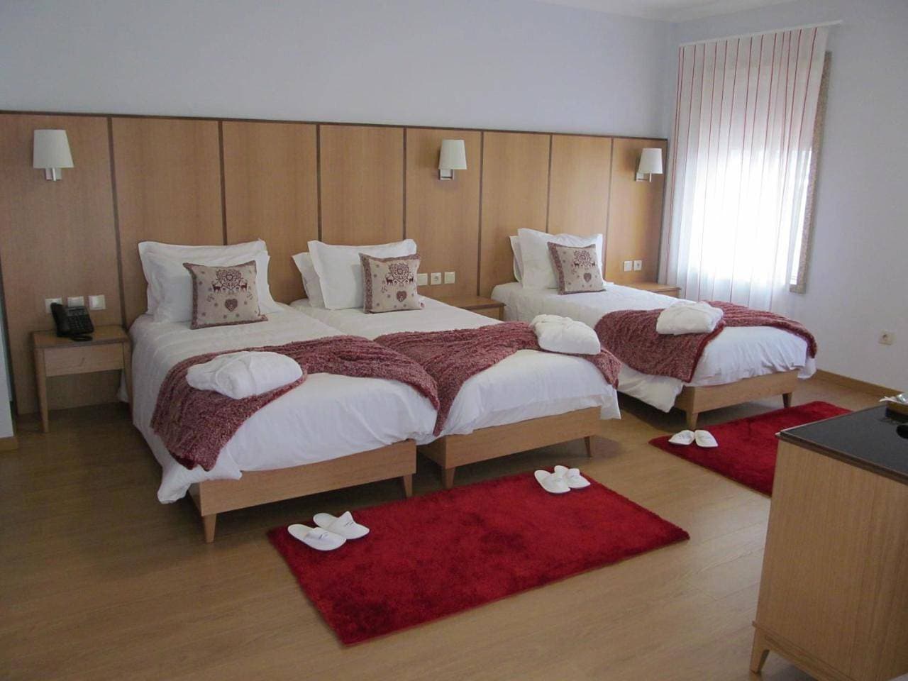 Foto 6 von 9: Triple Room with Balcony