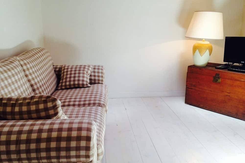 Foto 8 von 27: Charming house with beautiful garden, close to the beach. Free WiFi!