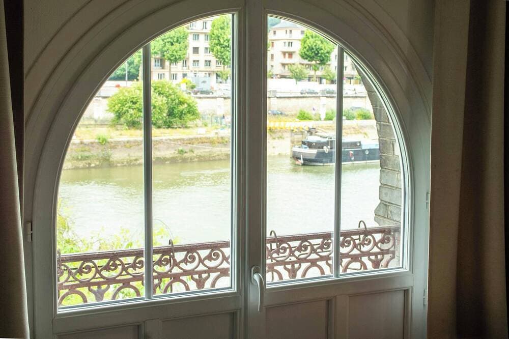 Foto 10 von 13: Apt with garden and parking on the banks of the Seine in front of the cathedral