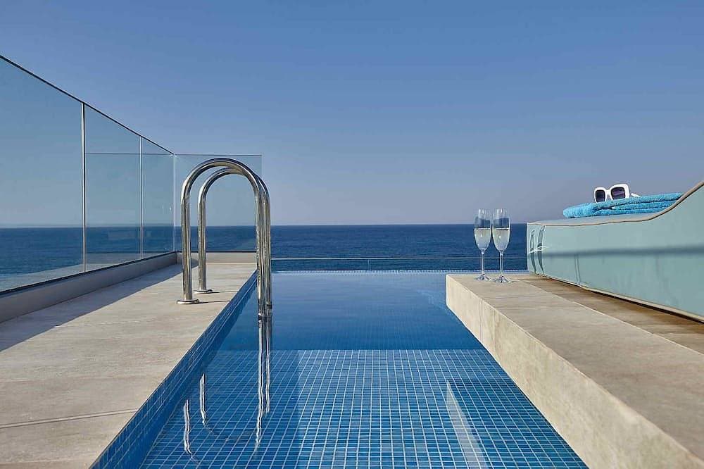 Foto 9 von 20: Neu 1 Schlafzimmer Apartments mit Meerblick, Infinity-Pool, familienfreundlich, Strand
