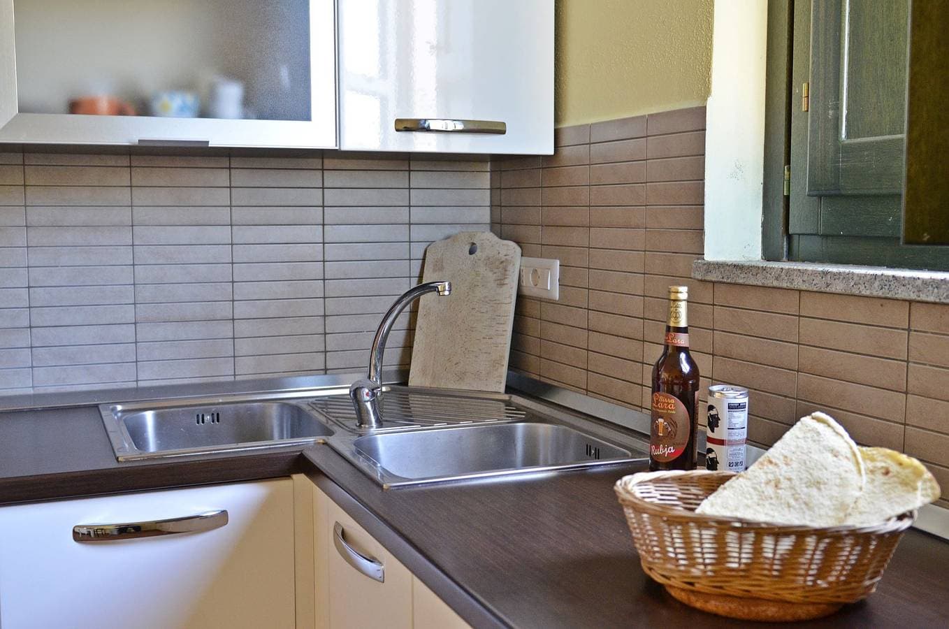 Foto 7 von 23: Ferienwohnung für 8 Personen mit Garten