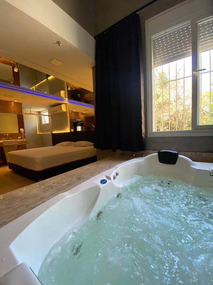 Foto 6 von 9: Studio with Spa Bath