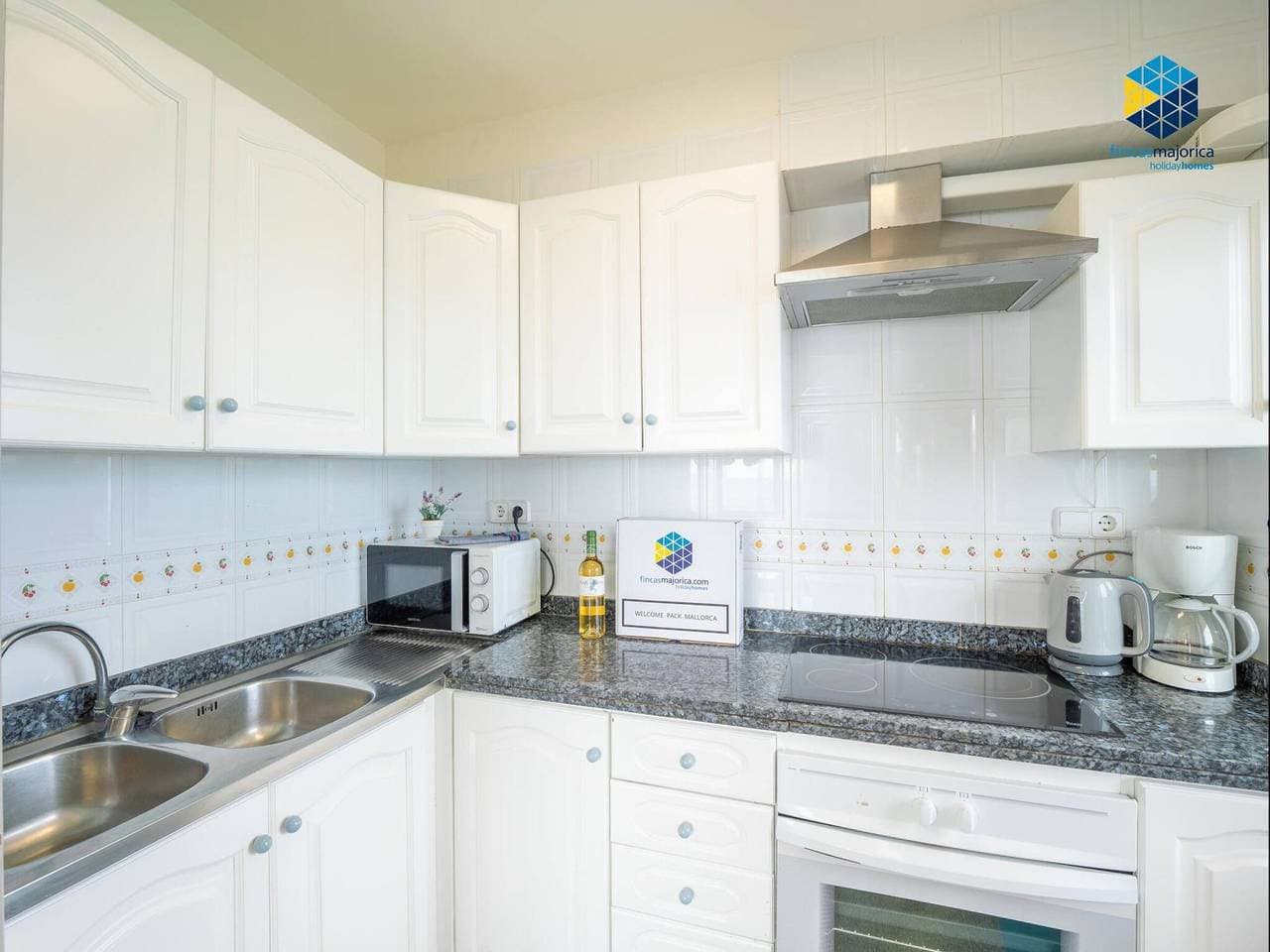 Foto 11 von 25: Charmante 2-Zi-Wohnung mit Terrasse, Klimaanlage und ausgestatteter Küche
