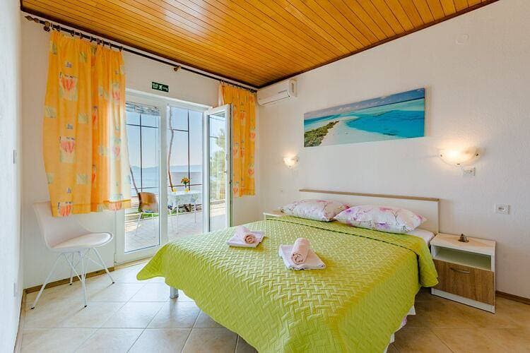Foto 6 von 18: Rooms Sani - Double Room with Terrace and Sea View (S3)