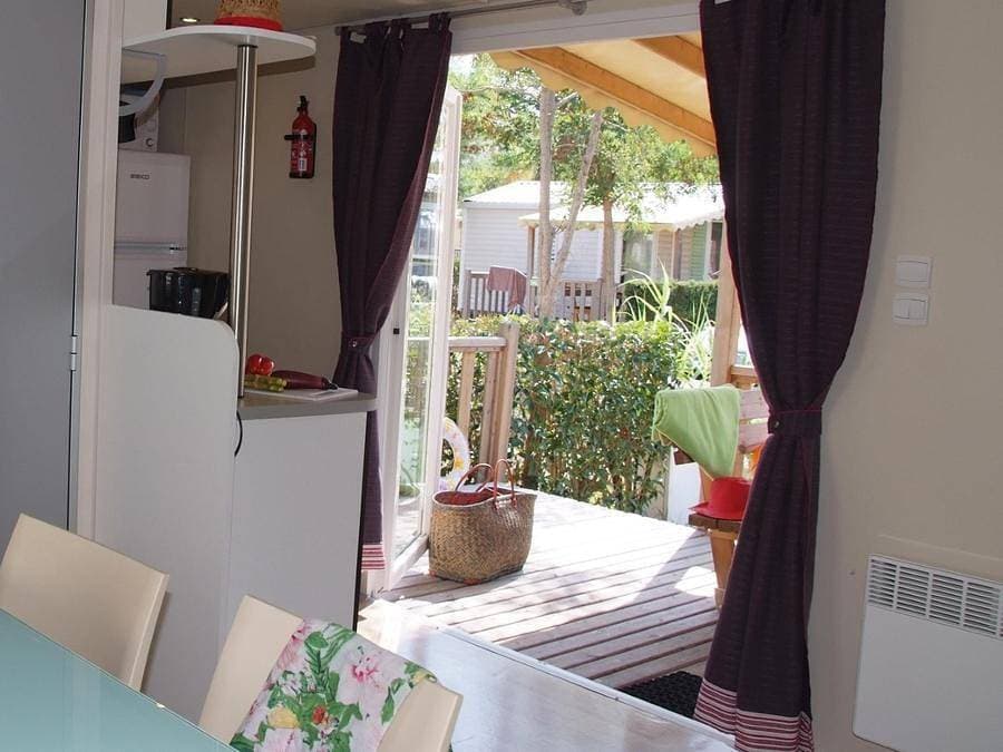 Foto 5 von 49: Camping Tikayan la Vallée du Paradis - Mobilheim 6 personen - Colorado Standard - 2 Schlafzimmer - Klima - TV