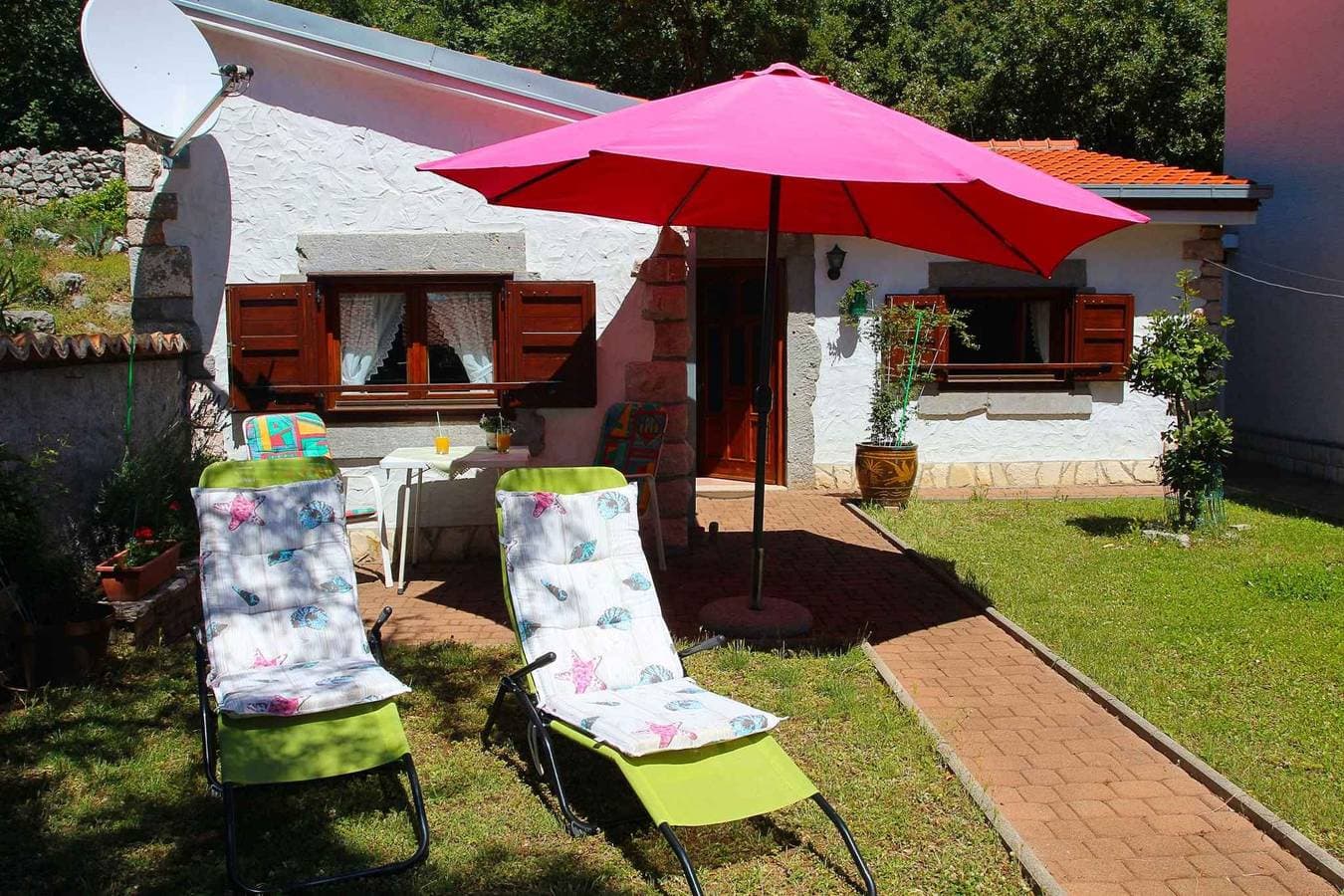 Foto 2 von 25: Ferienhaus mit Garten