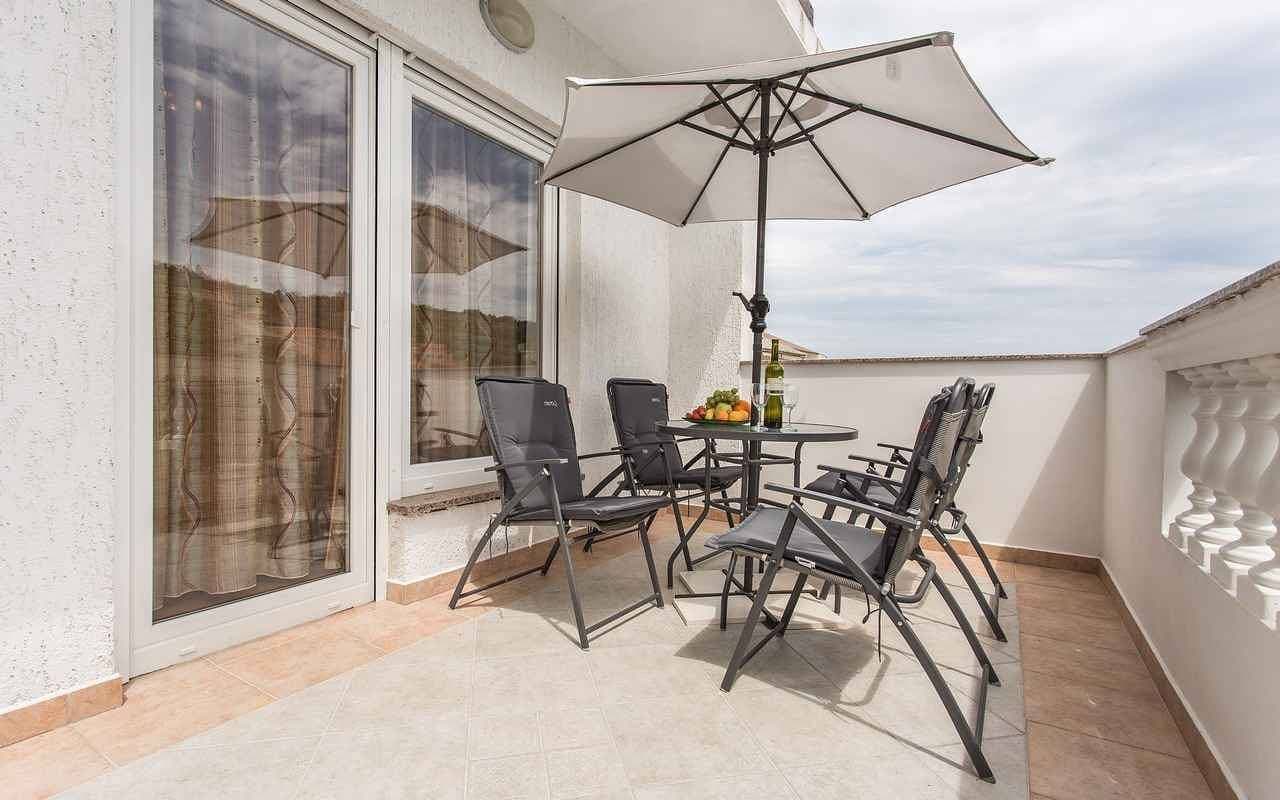 Foto 3 von 31: Ferienwohnung mit Klimananlage und Terrasse