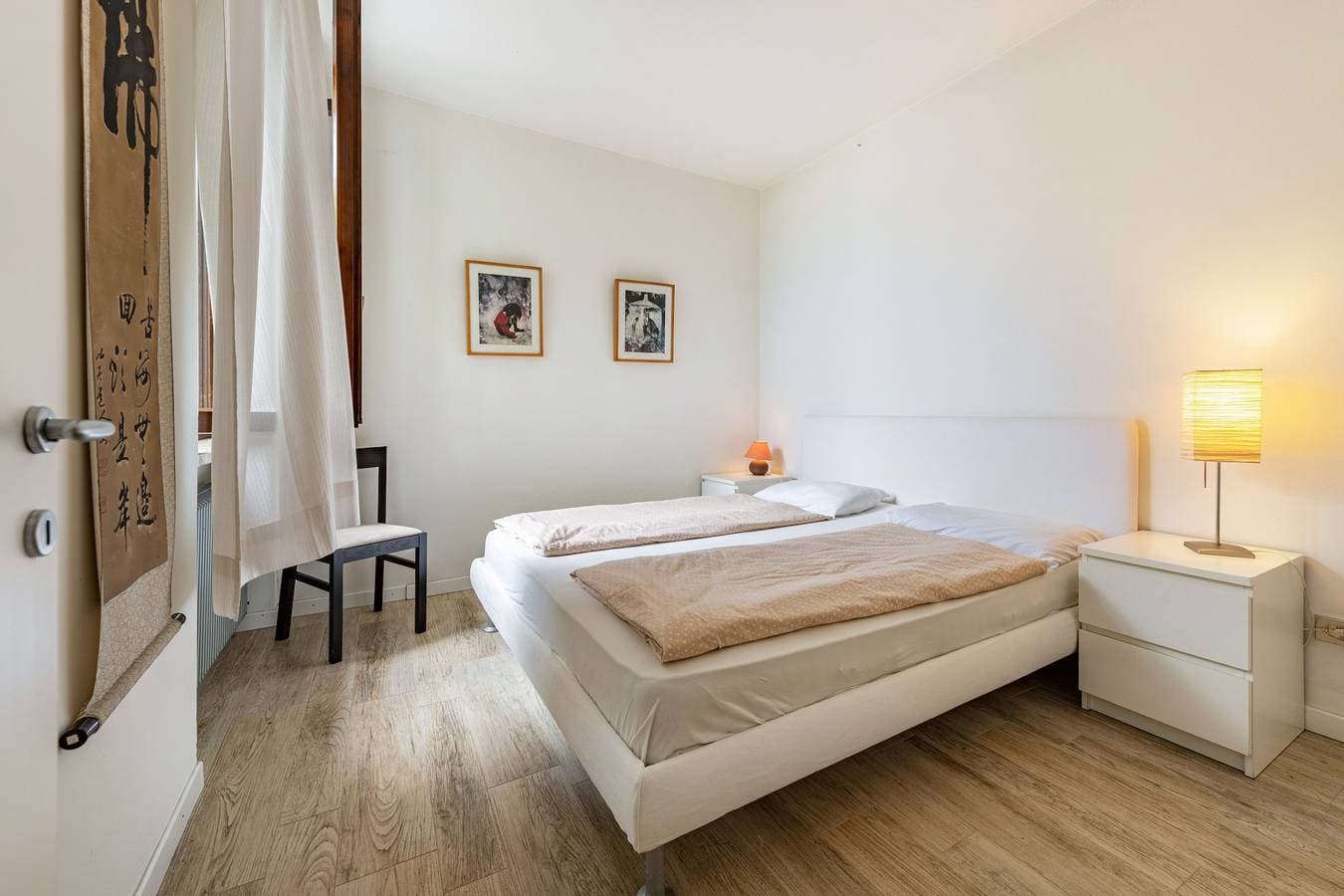 Foto 5 von 24: Ferienwohnung 'Villa Verde' mit Blick auf den See, Gemeinschaftspool und Klimaanlage