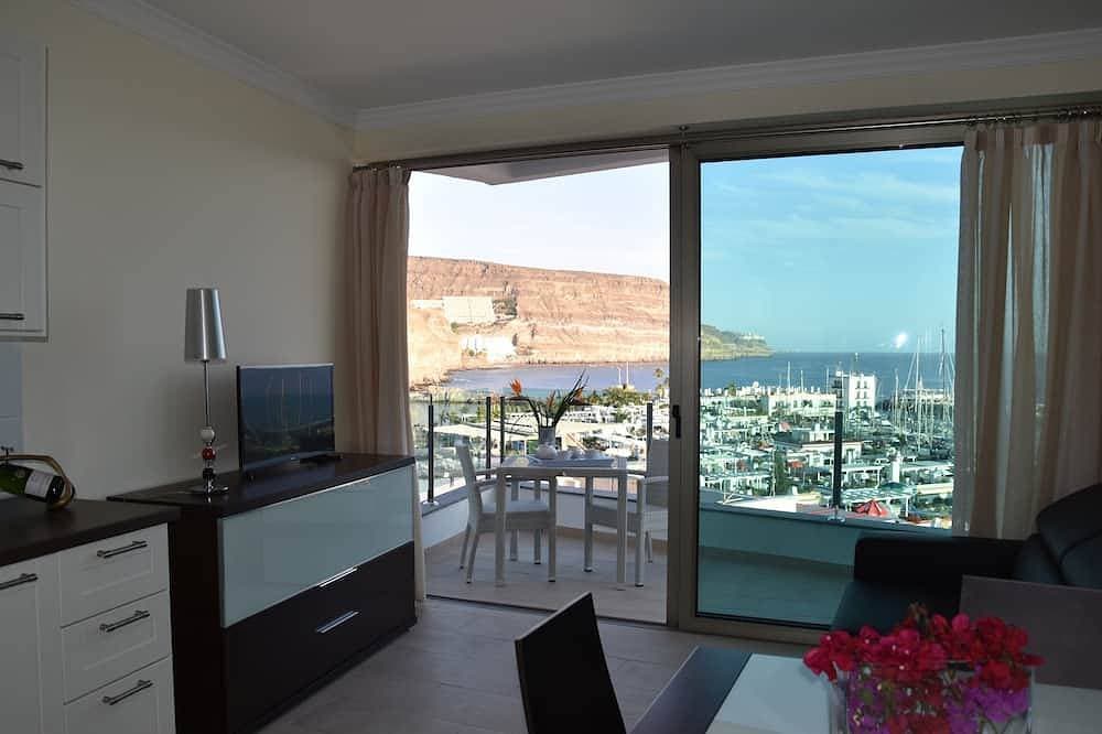 Foto 6 von 30: Apt. 1ºB \"Spectacular views of the sea and the marina of Puerto de Mogán\"