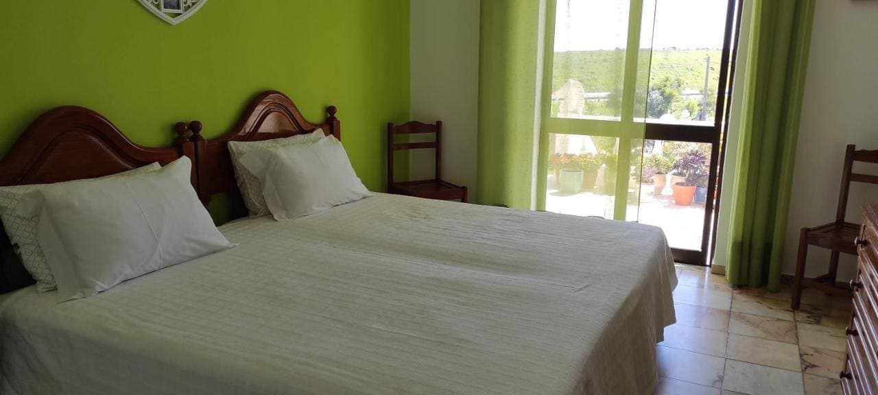 Foto 5 von 17: Double Room with Shared Bathroom