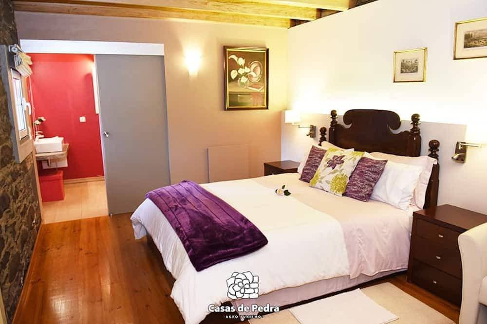 Foto 4 von 21: Casas de Pedra - Genießen Sie eine ländliche Atmosphäre mit allen Einrichtungen eines Hotels.