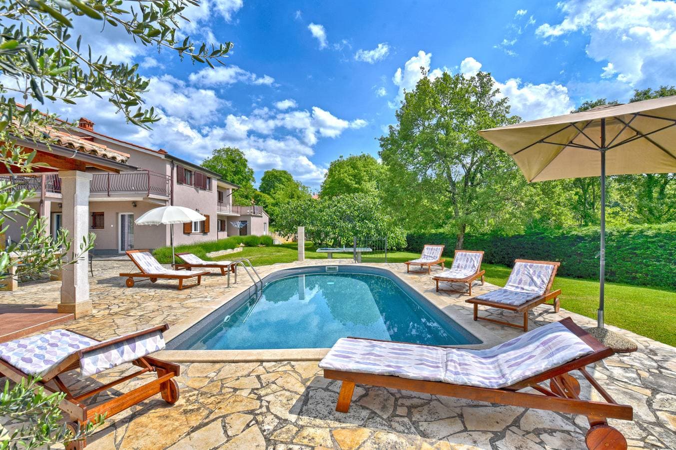 Foto 3 von 37: Ferienhaus für 7 Personen mit Terrasse