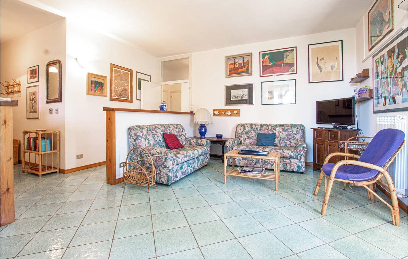 Foto 4 von 25: Gemütliche Wohnung mit Parkplatz, AC, Kochnische und Garten - 2km nach Le Rocchette