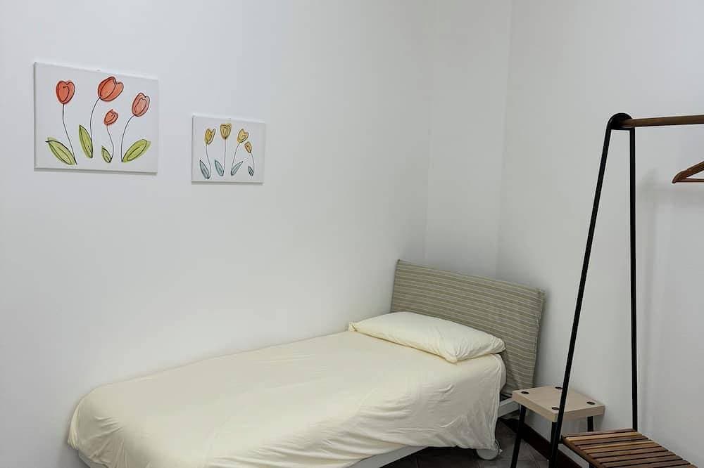 Foto 5 von 22: Maddy'S House Spacious apartment furnished with care and originality