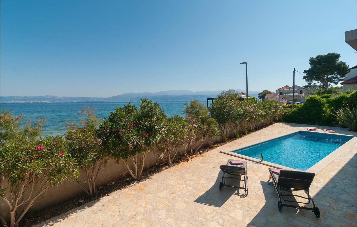 Foto 2 von 33: Gemütliche Ferienwohnung mit Meerblick, Pool und Terrasse, 400 m vom Strand entfernt