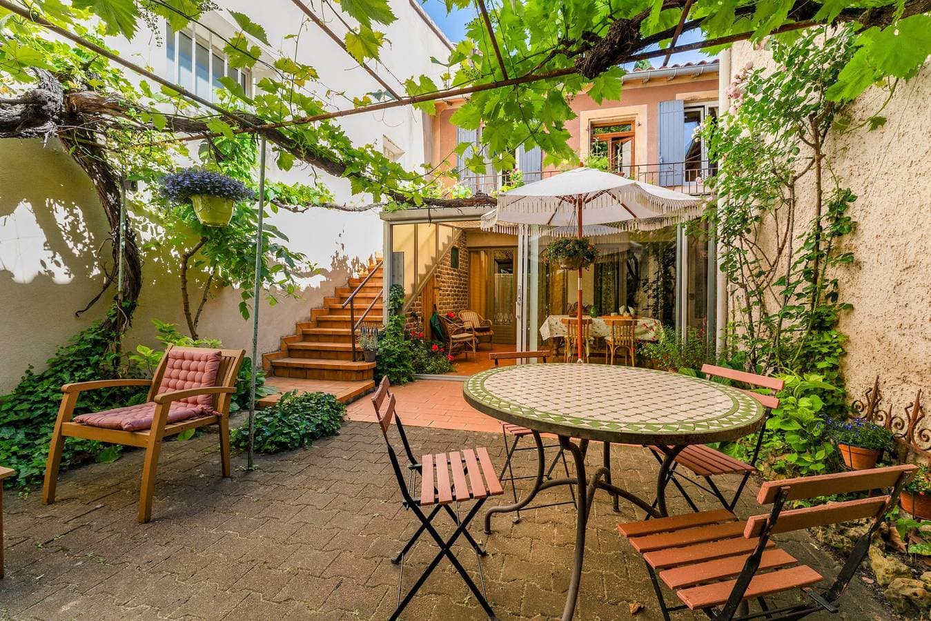 Foto 2 von 23: Zimmer 'Parfum De Soleil' mit gemeinsamer Terrasse, Gemeinschaftsgarten und WLAN